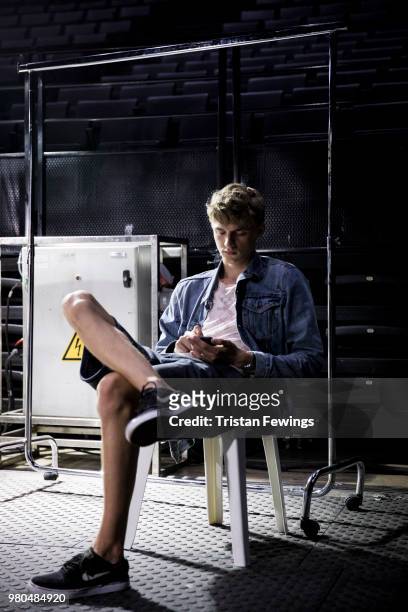 Model poses backstage prior the Ami Alexandre Mattiussi Menswear Spring Summer 2019 show as part of Paris Fashion Week on June 21, 2018 in Paris,...