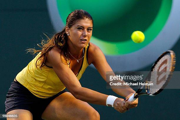 Sorana Cirstea of Romania returns a shot against Venus Williams of the United States during day three of the 2010 Sony Ericsson Open at Crandon Park...