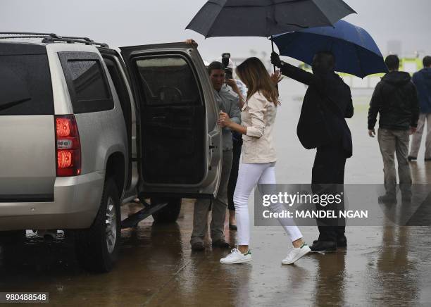 First Lady Melania Trump steps off a plane upon arrival at McAllen Miller International Airport in McAllen, Texas on June 21, 2018. - Melania Trump...