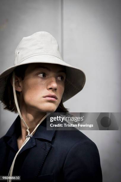 Model poses backstage prior the Ami Alexandre Mattiussi Menswear Spring Summer 2019 show as part of Paris Fashion Week on June 21, 2018 in Paris,...