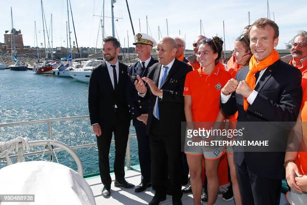 French President Emmanuel Macron , French Foreign Affairs Minister Jean-Yves Le Drian meet with members of the National Society of Sea Rescue aboard...