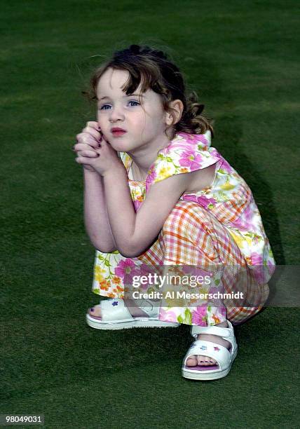 Todd Hamilton's three-year-old daughter Kaylee watches the trophy ceremonies on the 18th green to win the Honda Classic, March 14, 2004 at Palm Beach...