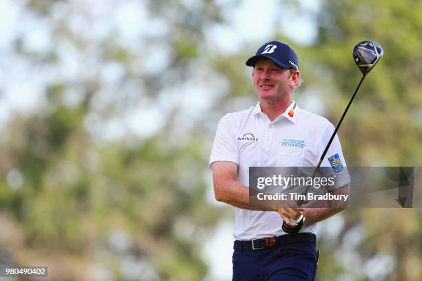 Brandt Snedeker of the United States plays his shot from the sixth tee during the first round of the Travelers Championship at TPC River Highlands on...