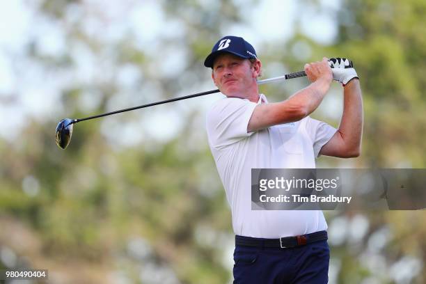 Brandt Snedeker of the United States plays his shot from the sixth tee during the first round of the Travelers Championship at TPC River Highlands on...