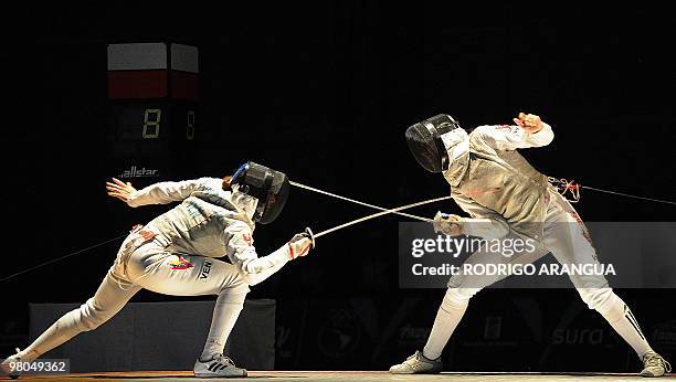 Venezuelan Mariana Gonzalez competes with her compatriot Yulitza Suarez in the women's fencing sabre event during the IX South American Games in...