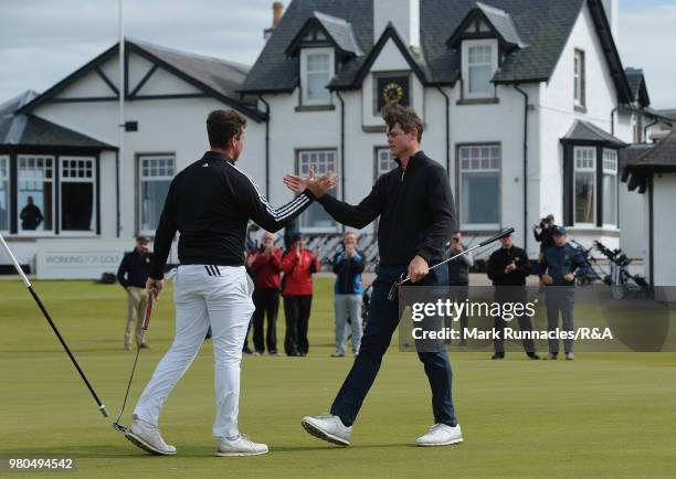 Tom Slowman of Taunton & Pickeridge , shakes hands with Wilco Nienaber of Republic of South Africa at the 18th hole after beating him by one hole...