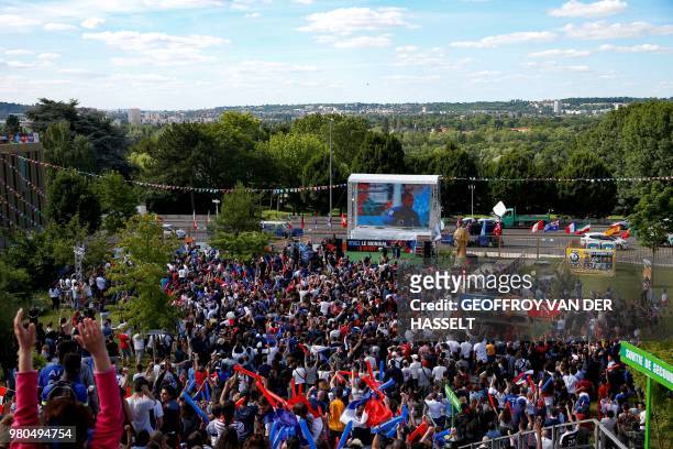 France's fans gather and watch the Russia 2018 World Cup Group C football match between France and Peru on a giant screen, at a fan zone set up in...