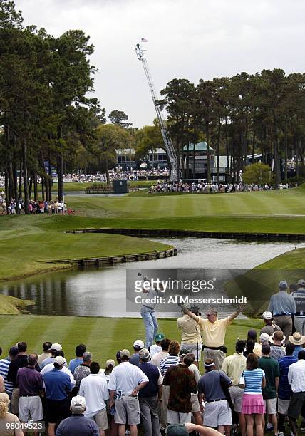 Adam Scott tees off on the 16th hole during second-round play at the PGA Tour's Players Championship March 26, 2004.