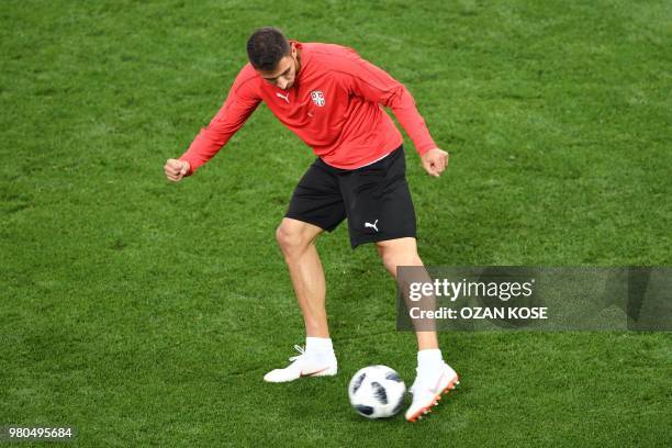 Serbia's midfielder Marko Grujic takes part in a training session at the Kaliningrad Stadium in Kaliningrad on June 21, 2018 on the eve of the Russia...