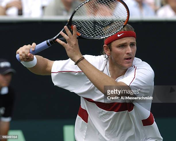 United States' Mardy Fish competes in the Davis Cup quarterfinals against Sweden's Jonas Bjorkman in Delray Beach, Florida April 9, 2004. Final...