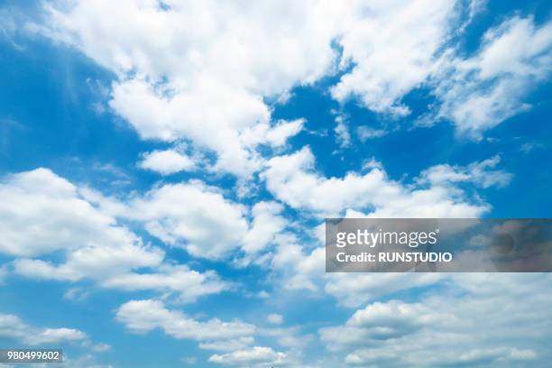 low angle view of clouds in sky - wolkenlandschap stockfoto's en -beelden