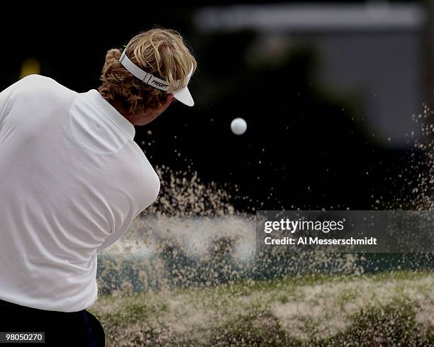 Golfer blasts from the sand in final-round play at the FedEx St. Jude Classic May 30, 2004 at the Tournament Players Club Southwind, Memphis,...