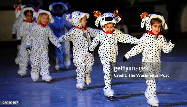 Sarah Lanier lead line of dalmatians on to the ice for their part during a rehearsal of The Good, The Bad & The Wicked On Ice at the Gardens Ice...