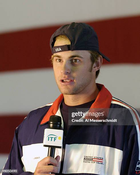 Andy Roddick films a commercial after the 2004 David Cup semifinal draw ceremony September 23, 2004 aboard the USS Yorktown near Daniel Island, South...