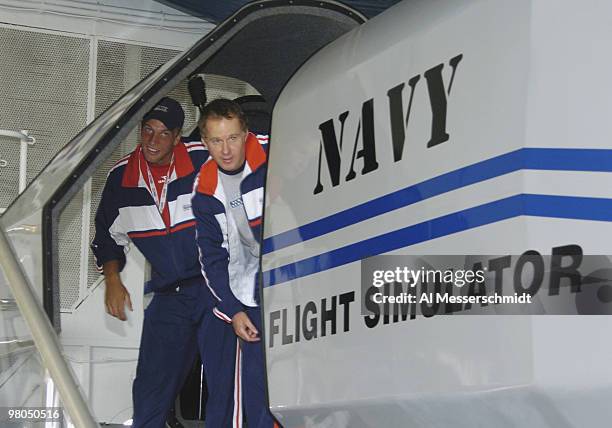 Captain Patrick McEnroe leaves a flight simultor after the 2004 David Cup semifinal draw ceremony September 23, 2004 aboard the USS Yorktown near...
