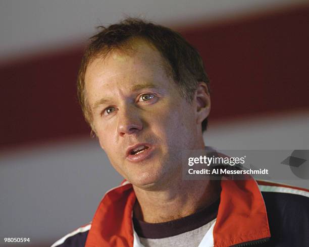 Captain Patrick McEnroe films a commercial after the 2004 David Cup semifinal draw ceremony September 23, 2004 aboard the USS Yorktown near Daniel...