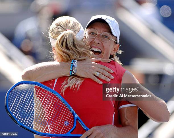 Martina Navratilova teams with Anna-Lena Groenefeld to advance from the 2005 U. S. Open quarterfinals in women's doubles with a 6-7 7-5 7-5 victory...