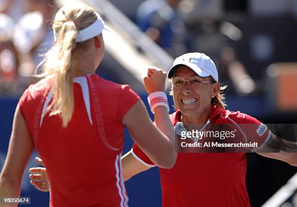 Martina Navratilova teams with Anna-Lena Groenefeld to advance from the 2005 U. S. Open quarterfinals in women's doubles with a 6-7 7-5 7-5 victory...