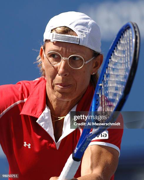 Martina Navratilova teams with Anna-Lena Groenefeld to advance from the 2005 U. S. Open quarterfinals in women's doubles with a 6-7 7-5 7-5 victory...