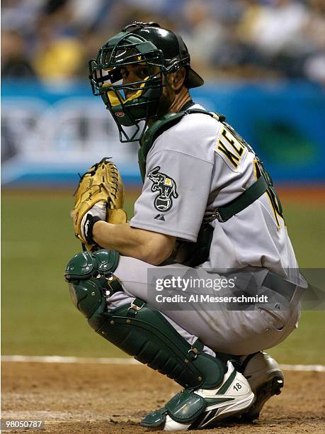 Oakland Athletics catcher Jason Kendall looks for a play against the Tampa Bay Devil Rays April 8, 2005 at Tropicana Field. The Rays beat the A's 3...