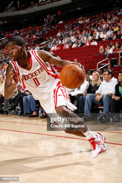 Aaron Brooks of the Houston Rockets drives the ball against the Los Angeles Clippers on March 25, 2010 at the Toyota Center in Houston, Texas. NOTE...