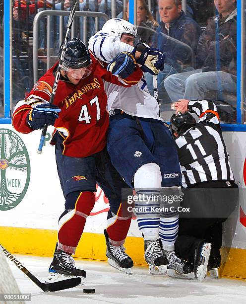 Rich Peverley of the Atlanta Thrashers collides with Viktor Stalberg of the Toronto Maple Leafs at Philips Arena on March 25, 2010 in Atlanta,...