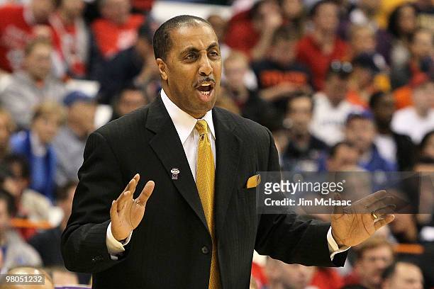 Head coach Lorenzo Romar of the Washington Huskies reacts against the West Virginia Mountaineers during the east regional semifinal of the 2010 NCAA...