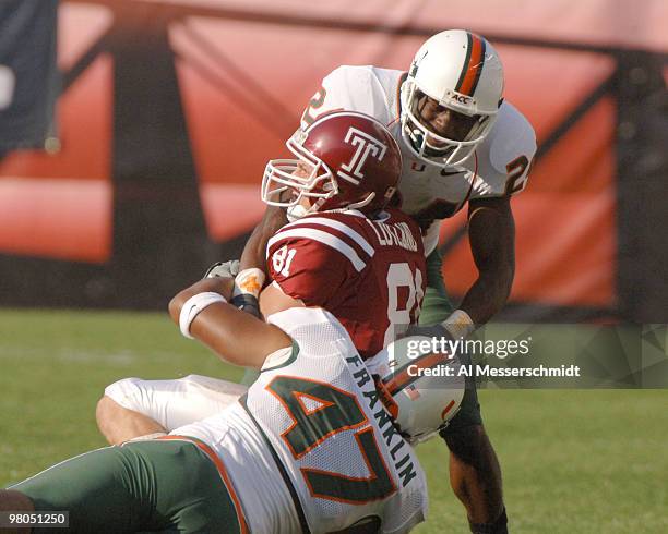 University of Miami defenders stop Temple wide receiver Michael Loveland at Lincoln Financial Field, October 15 in Philadelphia. The Hurricanes...