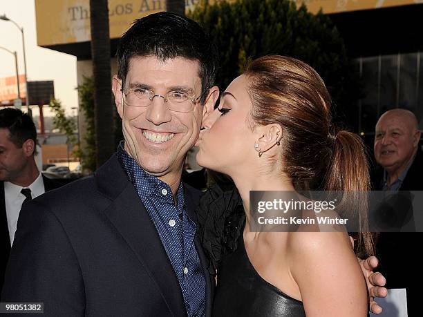 Chairman of The Walt Disney Studios Rich Ross and actress/singer Miley Cyrus arrive at the premiere of Touchstone Picture's "The Last Song" held at...