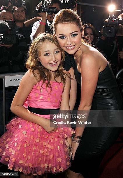 Noah Cyrus and actress/singer Miley Cyrus arrive at the premiere of Touchstone Picture's "The Last Song" held at ArcLight Hollywood on March 25, 2010...