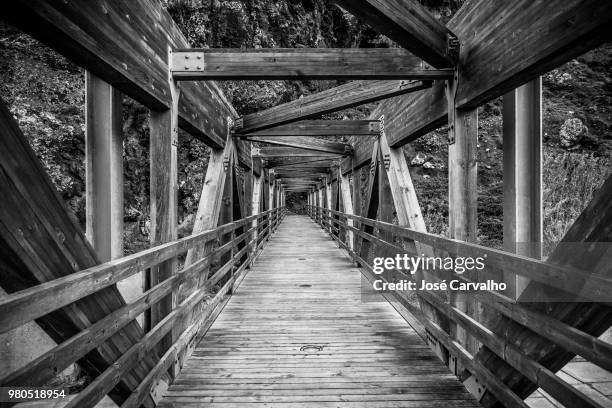 old wooden bridge, madera island, portugal - madera stock pictures, royalty-free photos & images