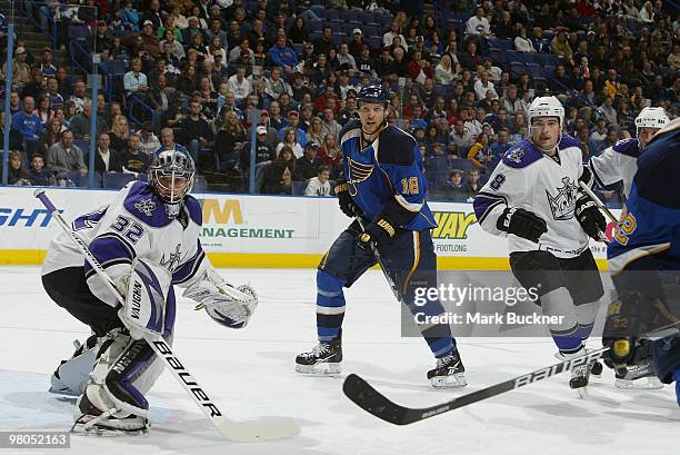 Jonathan Quick and Drew Doughty of the Los Angeles Kings defends against Jay McClement of the St. Louis Blues on March 25, 2010 at Scottrade Center...