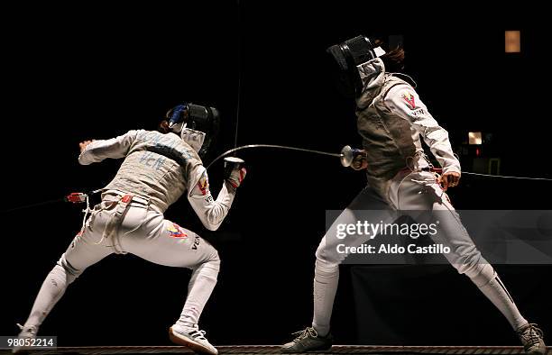 Yulitza Suarez of Venezuela in action against Mariana Gonzalez of Venezuela as part of the 2010 Odesur South America Games on March 25, 2010 in...