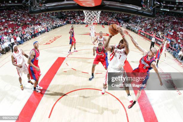 Kyle Lowry of the Houston Rockets shoots the ball over Steve Blake of the Los Angeles Clippers on March 25, 2010 at the Toyota Center in Houston,...