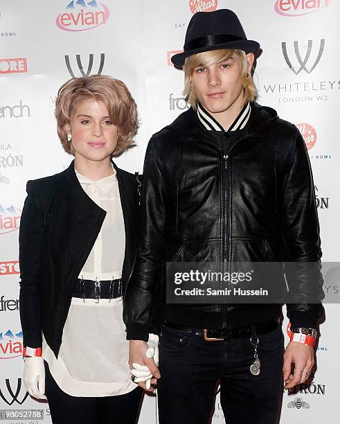 Kelly Osbourne and boyfriend Luke Worrall arrive at the Pop-Up Store launch party at Whiteleys on March 25, 2010 in London, England.