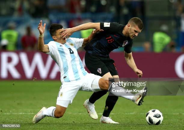 Ante Rebic of Croatia is tackled by Marcos Acuna of Argentina during the 2018 FIFA World Cup Russia group D match between Argentina and Croatia at...