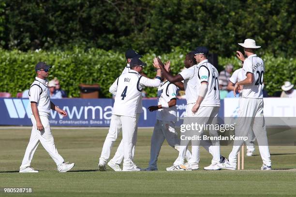 Keith Barker of Warwickshire celebrates the wicket of Darren Stevens of Kent on day two of the Specsavers County Championship: Division Two match...