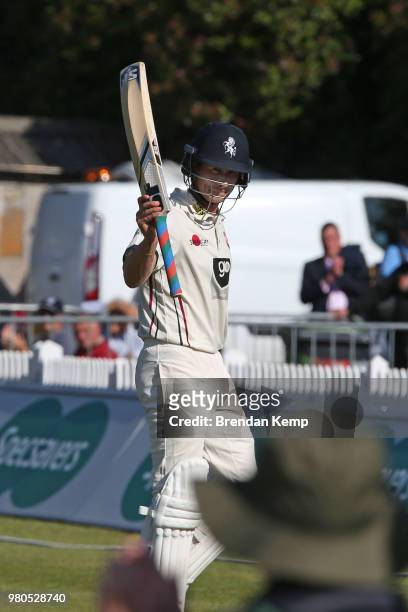 Joe Denly of Kent acknowledges the crowd after being dismissed for 119 on day two of the Specsavers County Championship: Division Two match between...