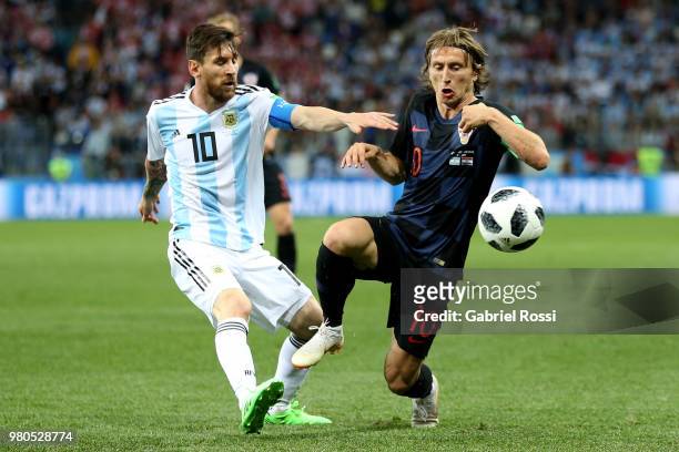 Lionel Messi of Argentina challenge for the ball with Luka Modric during the 2018 FIFA World Cup Russia group D match between Argentina and Croatia...