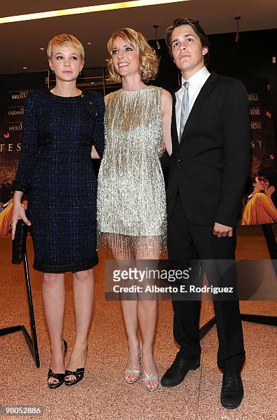 Actress Carey Mulligan, writer/director Shana Feste and actor Johnny Simmons arrive at the premiere of The Creative Coalition's "The Greatest" held...