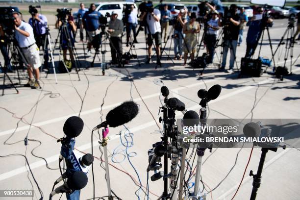 Press wait for mayors outside the Tornillo Port of Entry where minors crossing the boarder without the proper papers have been housed after being...