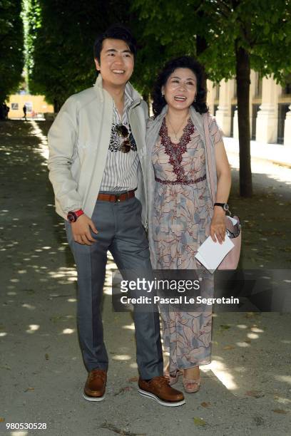 Lang Lang and his mother attend the Louis Vuitton Menswear Spring/Summer 2019 show as part of Paris Fashion Week on June 21, 2018 in Paris, France.