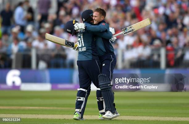 Jason Roy of England celebrates reaching his century with Jonathan Bairstow during the 4th Royal London One Day International between England and...