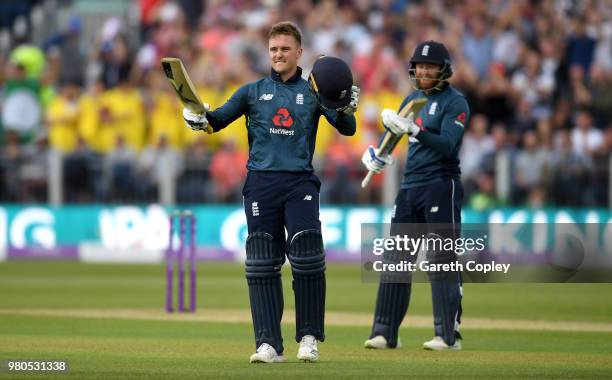 Jason Roy of England celebrates reaching his century with Jonathan Bairstow during the 4th Royal London One Day International between England and...