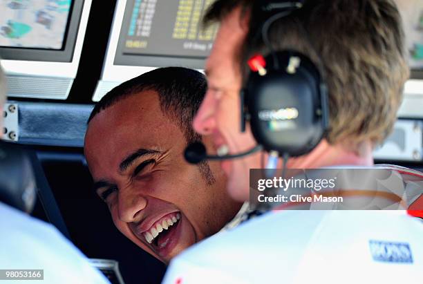 Lewis Hamilton of Great Britain and McLaren Mercedes is seen on the pitwall as he prepares to drive during practice for the Australian Formula One...