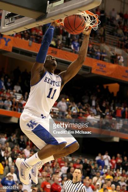 John Wall of the Kentucky Wildcats dunnks against the Cornell Big Red during the east regional semifinal of the 2010 NCAA men's basketball tournament...