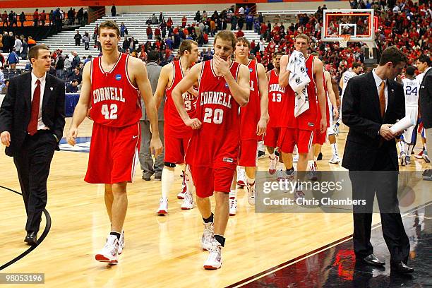 Mark Coury, Ryan Wittman and Jeff Foote of the Cornell Big Red walk off the court dejected after Cornell lost 62-45 against the Kentucky Wildcats...