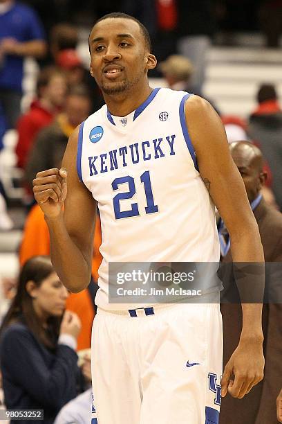 Perry Stevenson of the Kentucky Wildcats celebrates after Kentucky won 62-45 against the Cornell Big Red during the east regional semifinal of the...