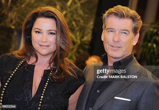 Actor Pierce Brosnan and his wife Keely Shaye Smith on the red carpet as they arrive for the premiere of "The Greatest" at the Linwood Dunn theater...