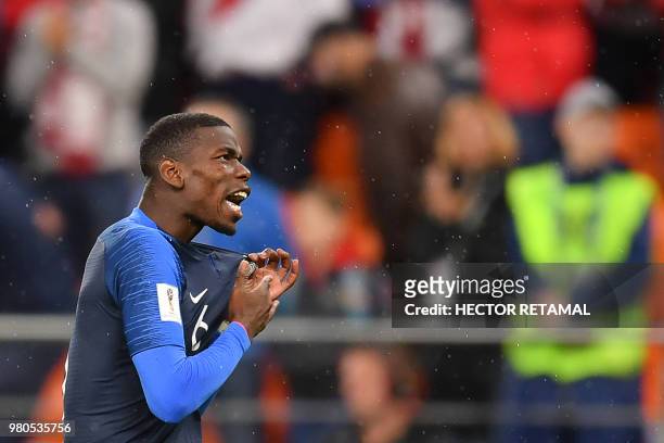 France's midfielder Paul Pogba celebrates victory during the Russia 2018 World Cup Group C football match between France and Peru at the Ekaterinburg...